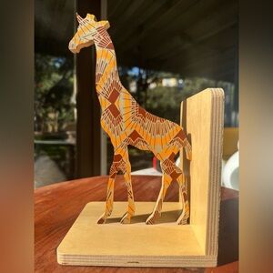 Wooden giraffe bookend by Wolfum